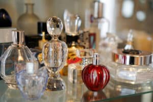 Perfume bottles illustrating synthetic fragrance health effects and the hidden risks of chemical exposure.